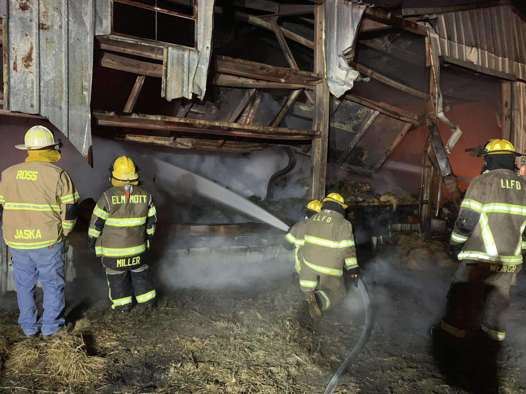 Crews attack a barn fire alongside mutual-aid partners